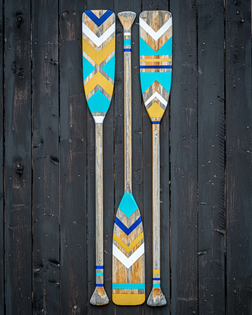 Paddles decorating a fish shed at Norris Point