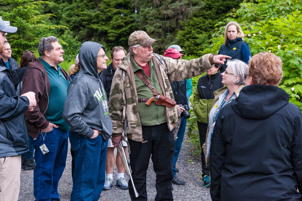 Tour guide sporting both a hand gun and a rifle! | Focus On Mee | Robert Mee