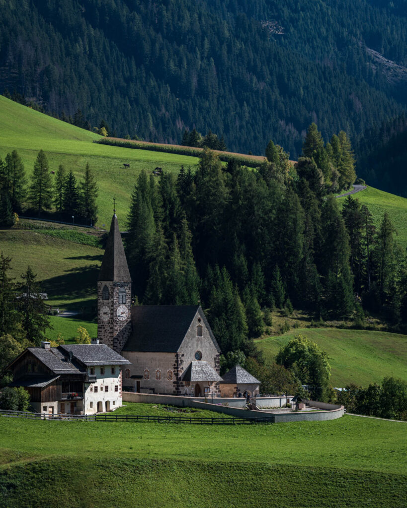 Santa Maddalena/St. Magdalena Church with Geisler Group mountains in the background