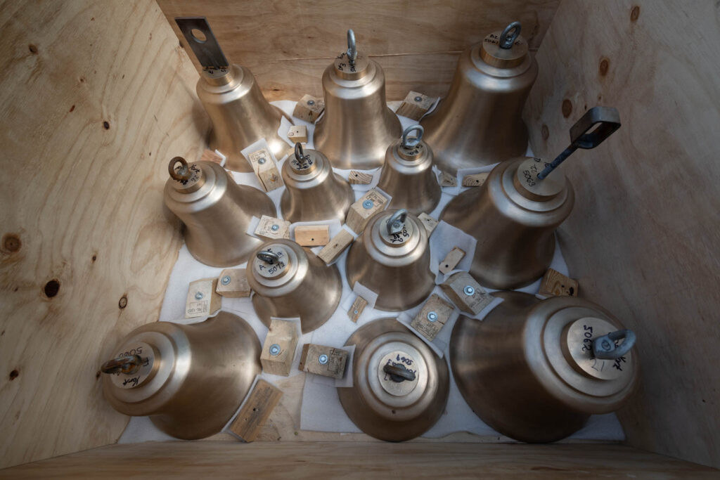 On the ground waiting to be hoisted into the Memorial Bell tower