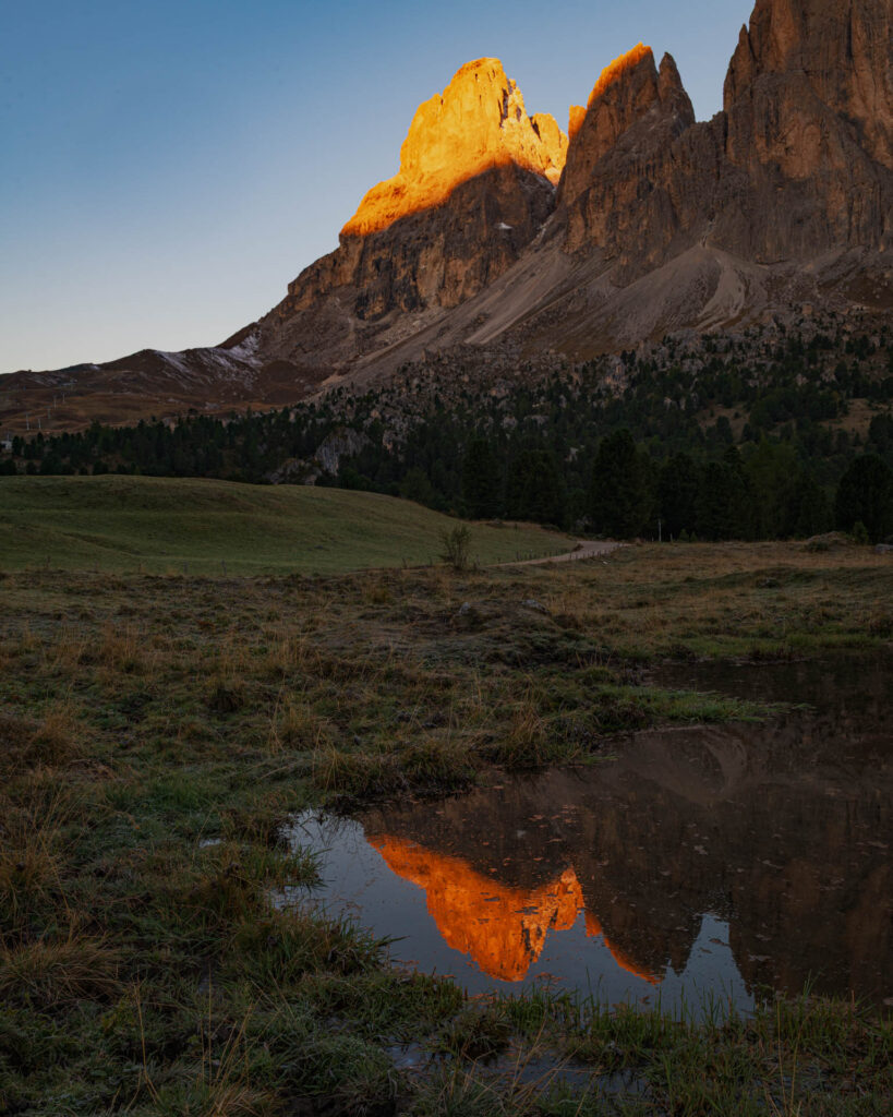 Sassolungo and surrounding mountains at sunrise (alpenglow)