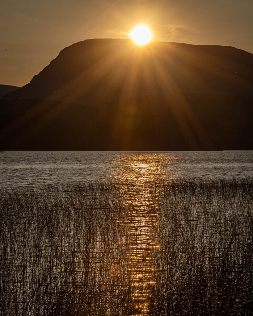 Sunrise above Gros Morne Mountain at Rocky Harbour Pond