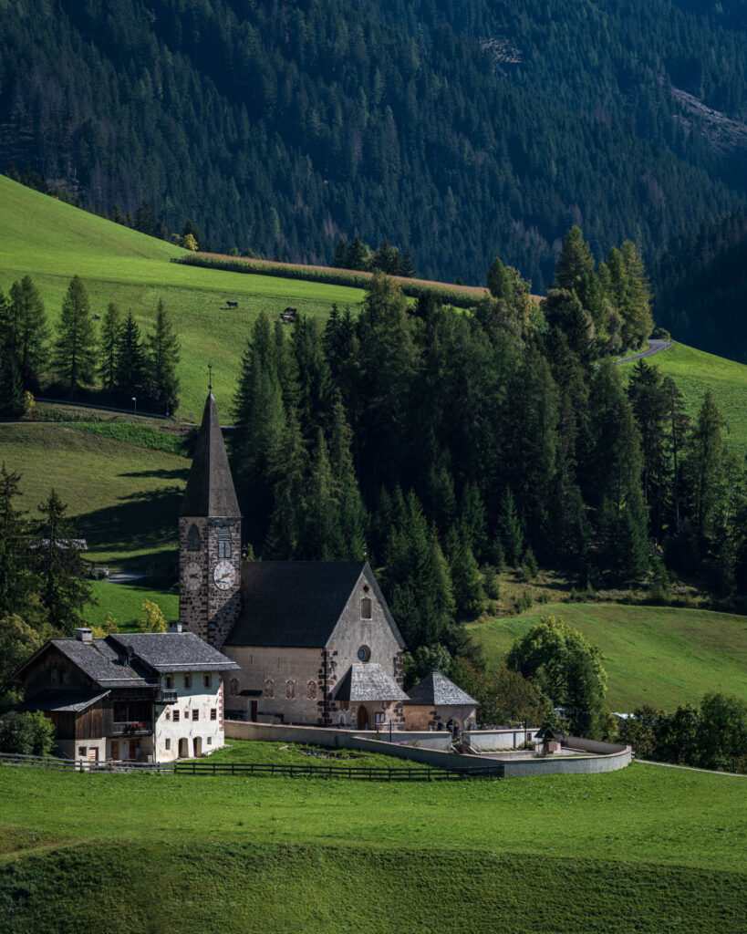 Santa Maddalena/St. Magdalena Church with Geisler Group mountains in the background